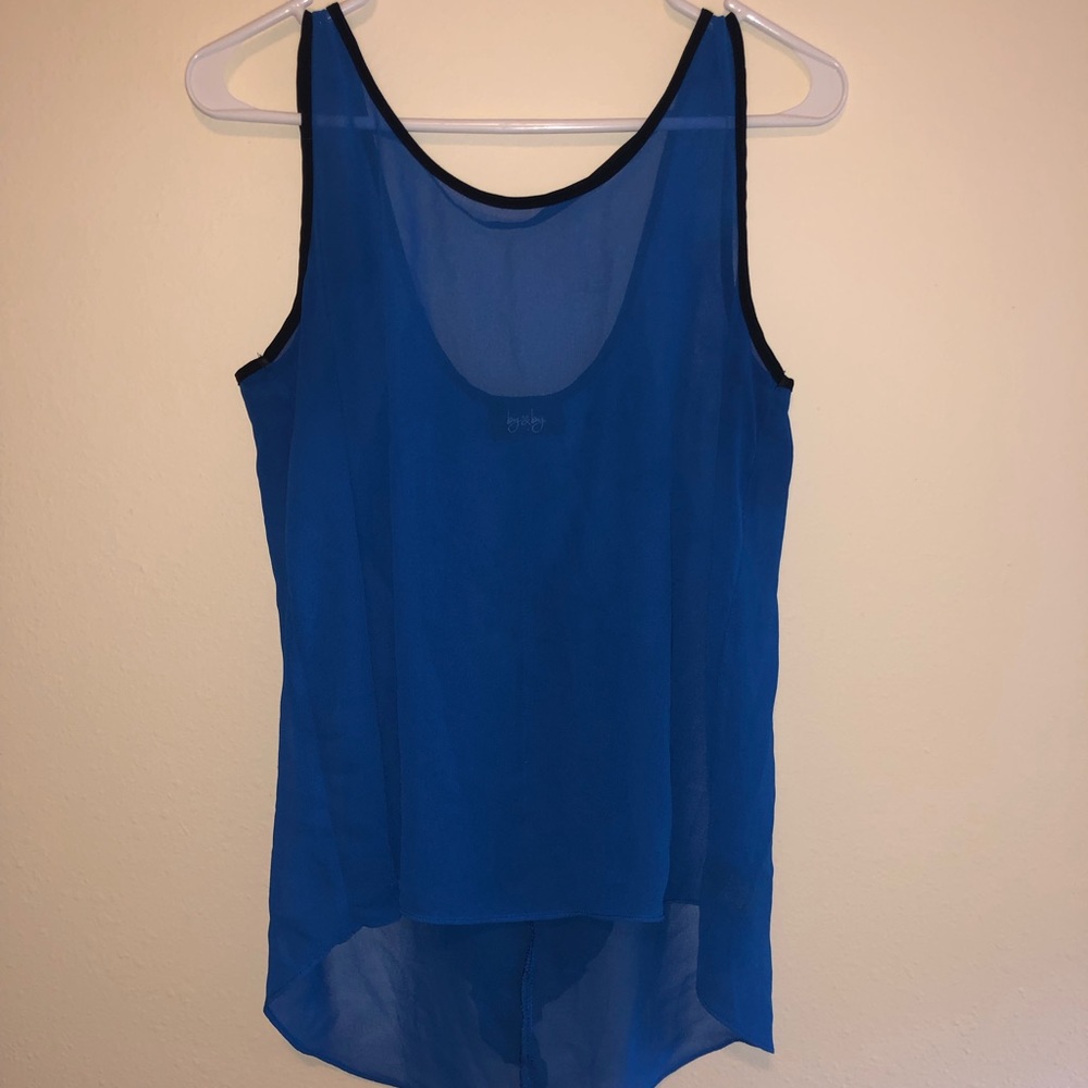 Blue tank top with black bow backing